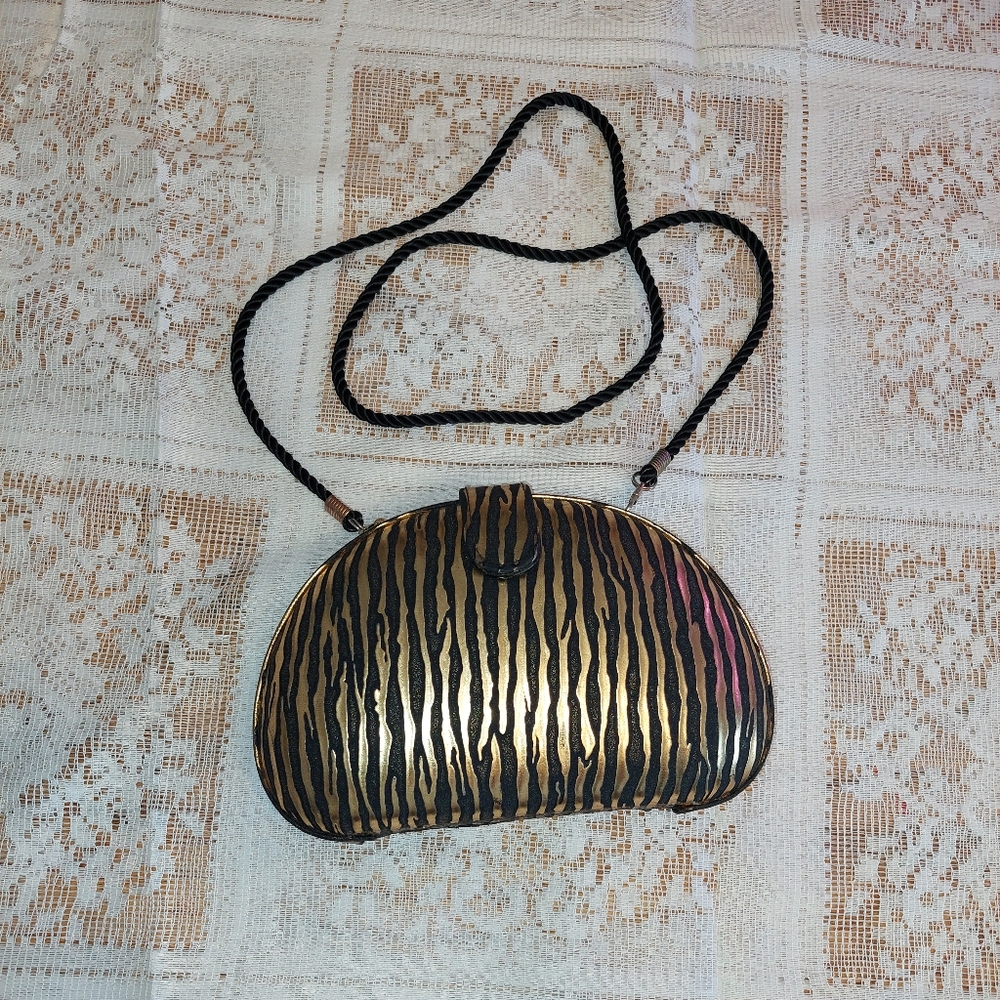 Black and gold zebra sholder clutch